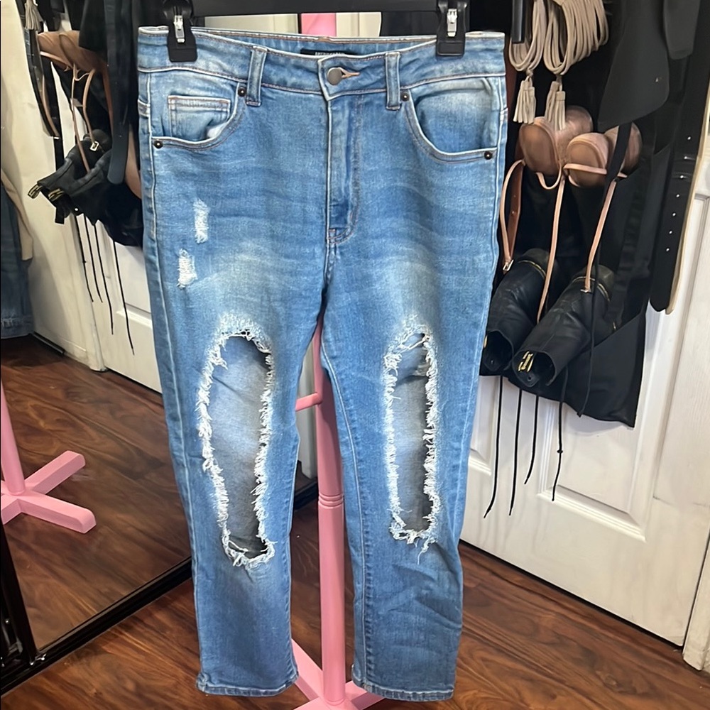 Distressed Blue Denim Jeans